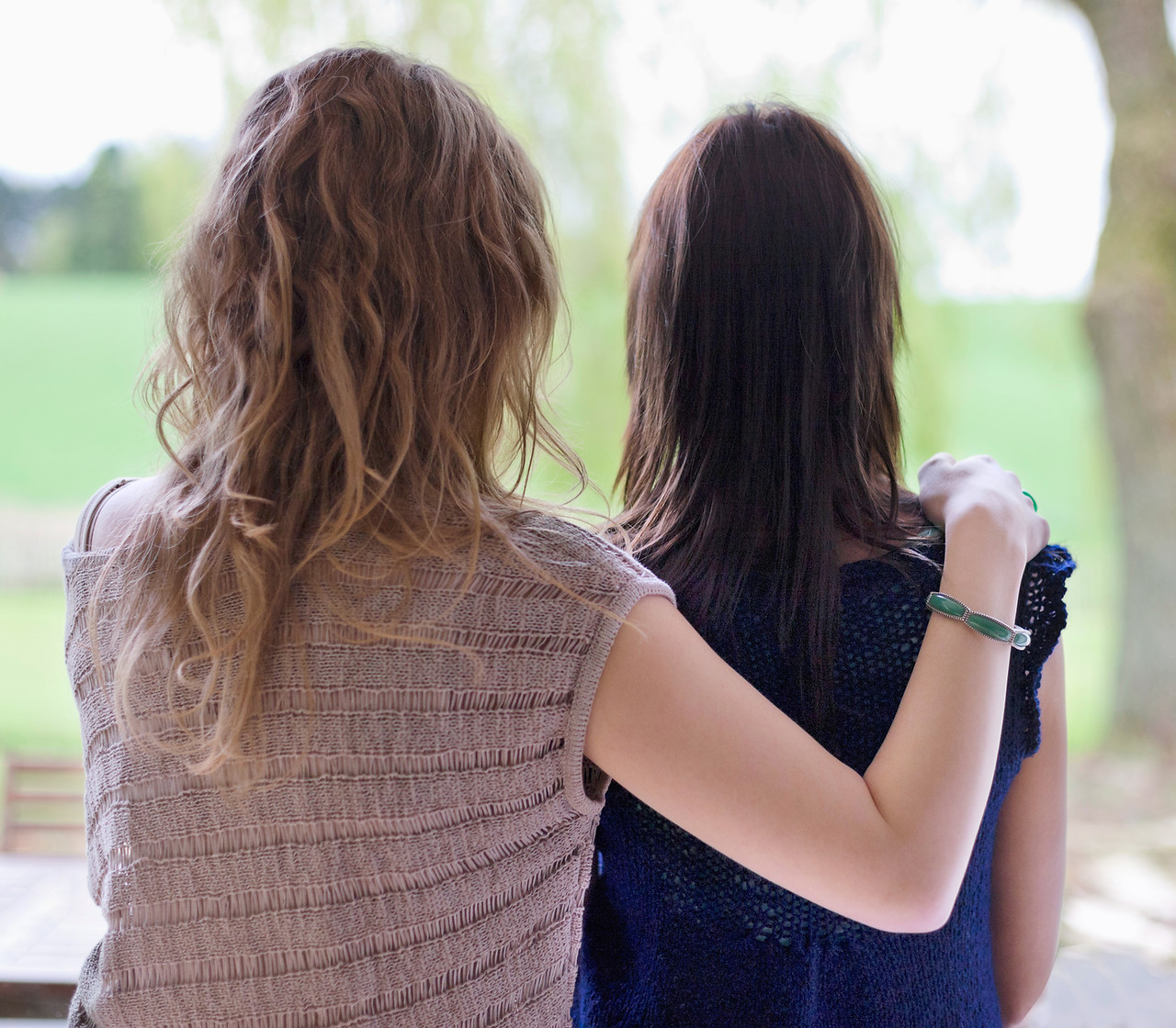 One person offering comfort to another